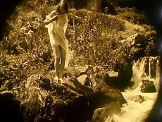 Nude Woman by Waterfall (1920)